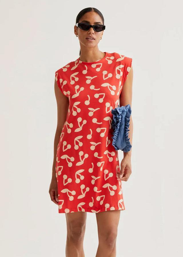 cherry print shirt dress It's here: Our warm-weather-ready collection of dresses inspired by French market finds. Perhaps the most twirl-worthy option of the lot, the Umbria Dress boasts a coquette-ish thigh-high hem and charming cherry print